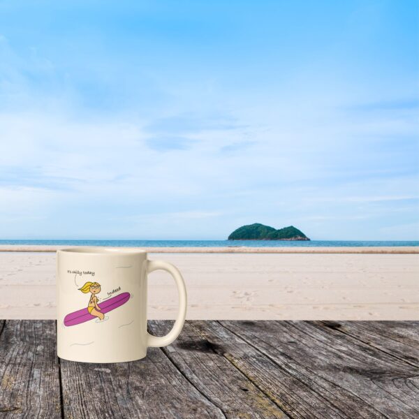 a surf mug in a deck in front a beautiful beach with an island